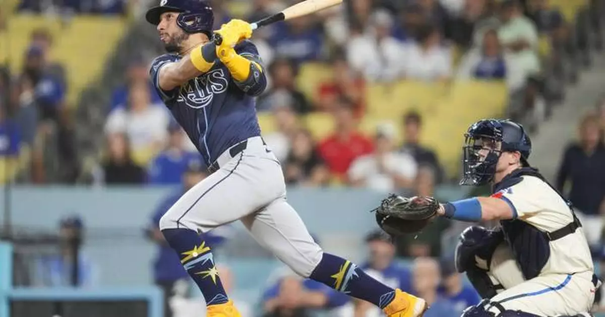 Caballero's 2-run homer off Kelly in the 10th lifts Rays over Dodgers 9-8