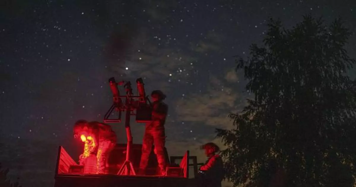 With men at the front lines, women watch over Ukraine's night sky for Russian drones