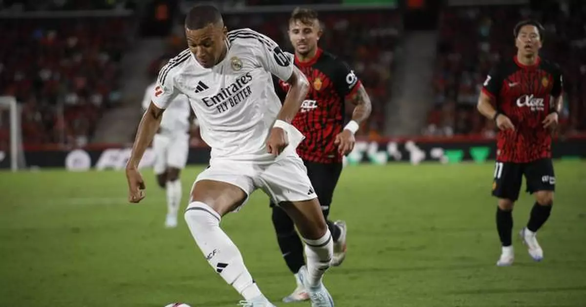 No goal for Mbappé in his Spanish league debut as Real Madrid draws 1-1 at Mallorca