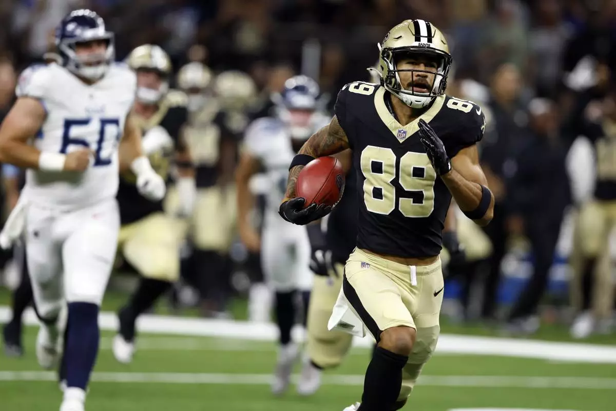 Samson Nacua (89) of the New Orleans Saints returns a missed field goal attempt during the first half of an NFL football game against the Tennessee Titans, Sunday, Aug. 25, 2024, in New Orleans. (AP Photo/Butch Dill)