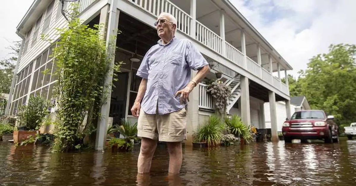 The Latest: Debby moves inland as the tropical depression soaks the Carolinas