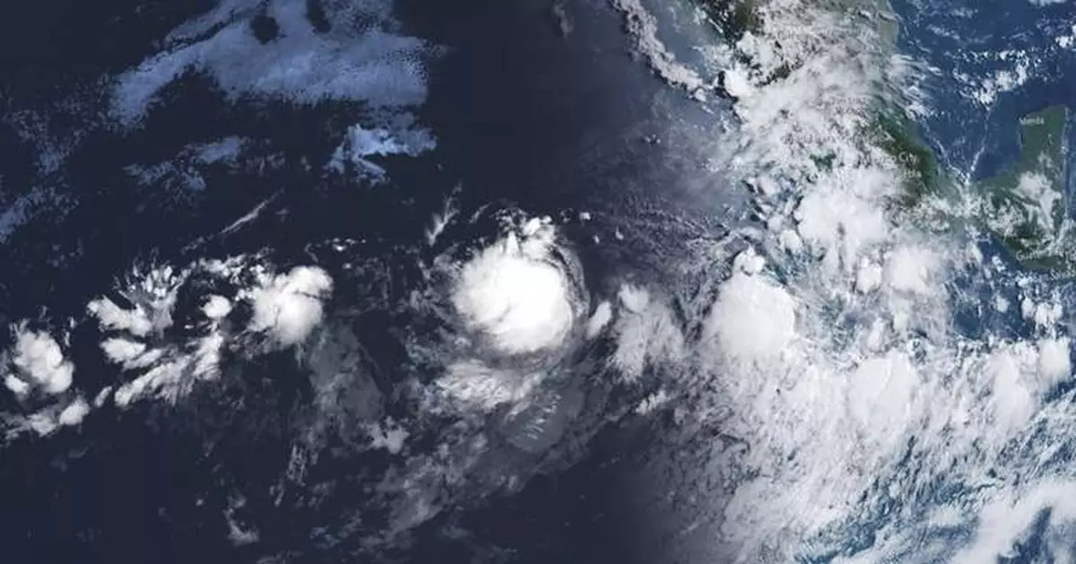 Gilma becomes 2nd hurricane of eastern Pacific season and is forecast to strengthen away from land