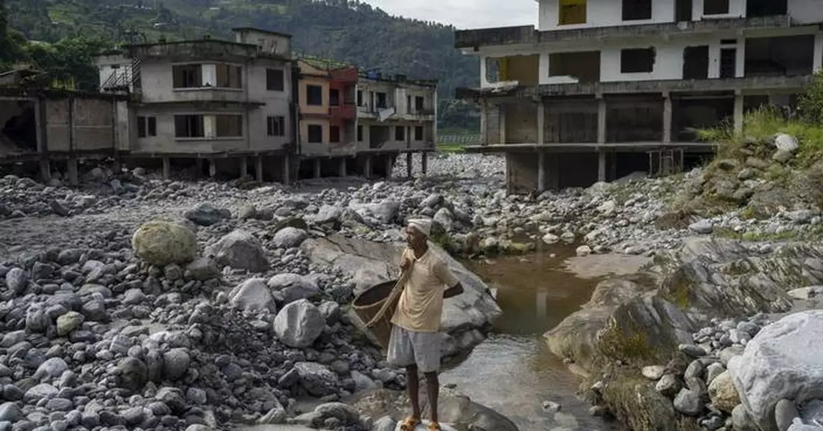 AP PHOTOS: Cascading disasters push residents of a Nepalese valley to the brink