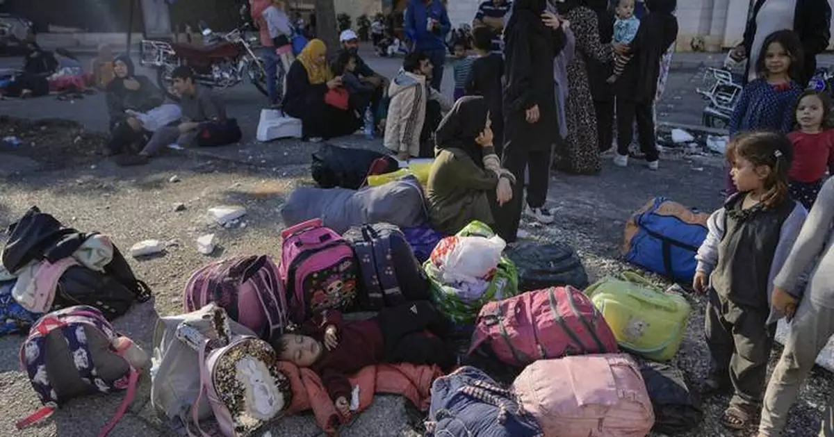 Hundreds of fleeing families sleep on beaches and streets after Israel's strikes shake Beirut