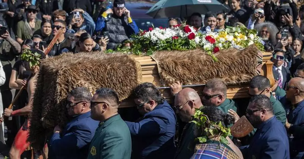 A Māori king who urged racial unity in New Zealand is laid to rest and a new queen rises