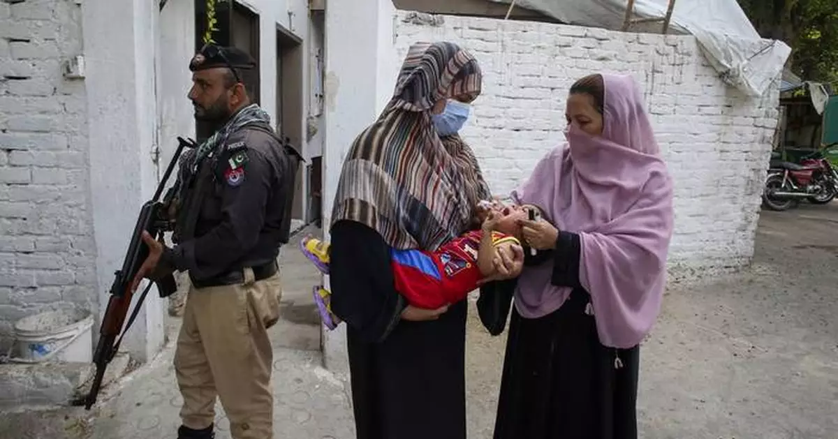 Gunmen kill a polio worker and a policeman during a vaccination campaign in Pakistan