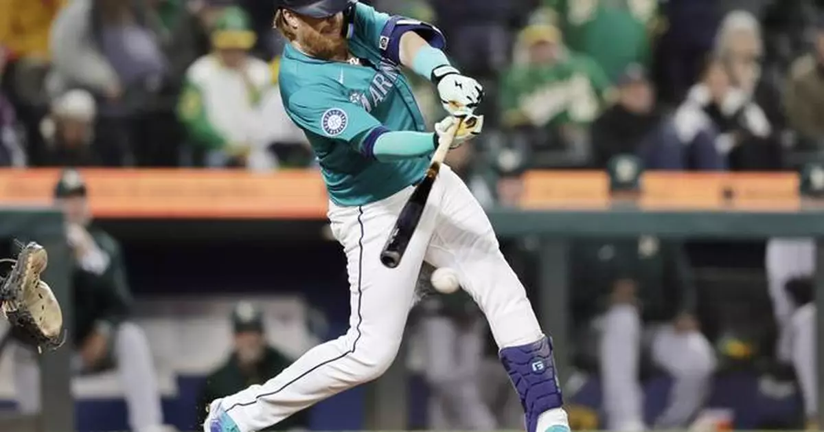 Raley rallies Mariners twice, Raleigh homers in 7-6 win over A's in 10 innings