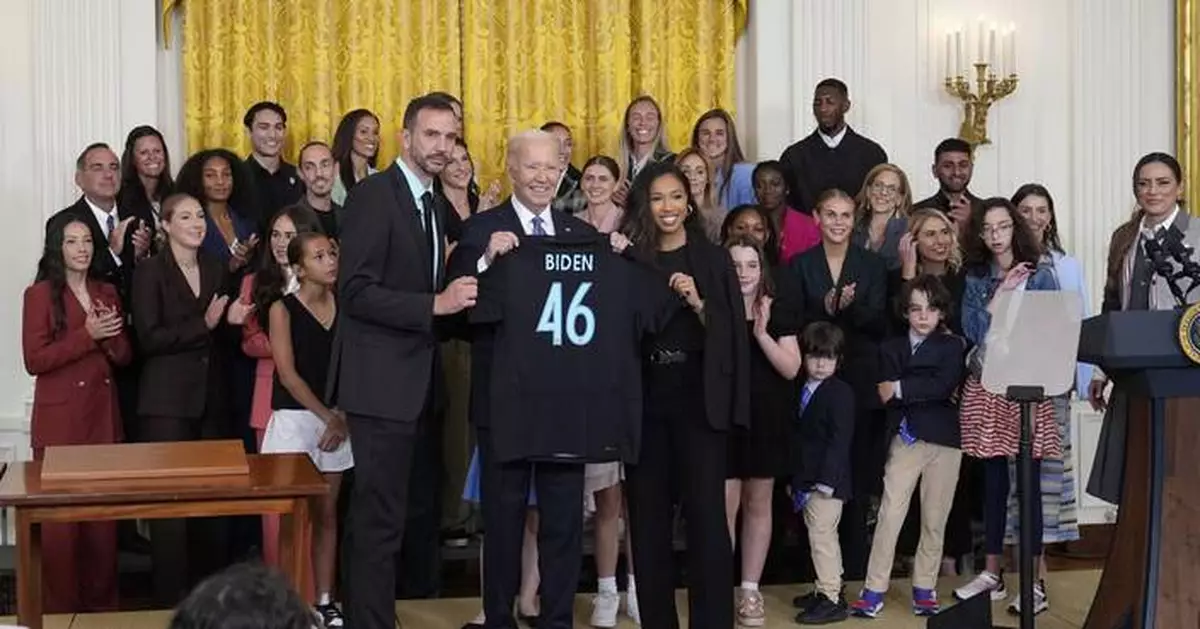 As he welcomes Gotham FC, Biden says 'a woman can do anything a man can do,' including be president