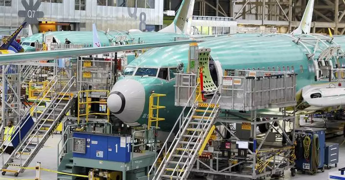 Boeing says it has a deal to avoid a strike by more than 30,000 machinists