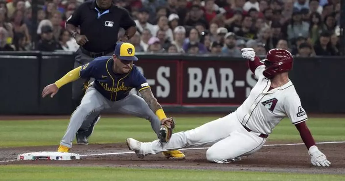 Hoskins homers, Brewers extend NL Central lead with 2-1 win over Diamondbacks