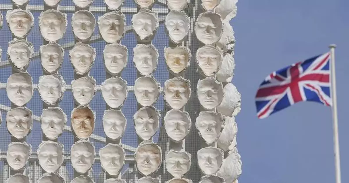 Faces of transgender people adorn an artwork in London's Trafalgar Square