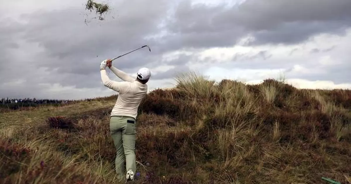 Rory McIlroy survives a strong wind for a 69 to lead Irish Open over Manassero