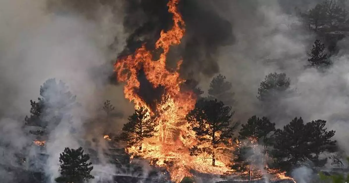 A Colorado man is charged with arson in a wildfire that destroyed 29 homes