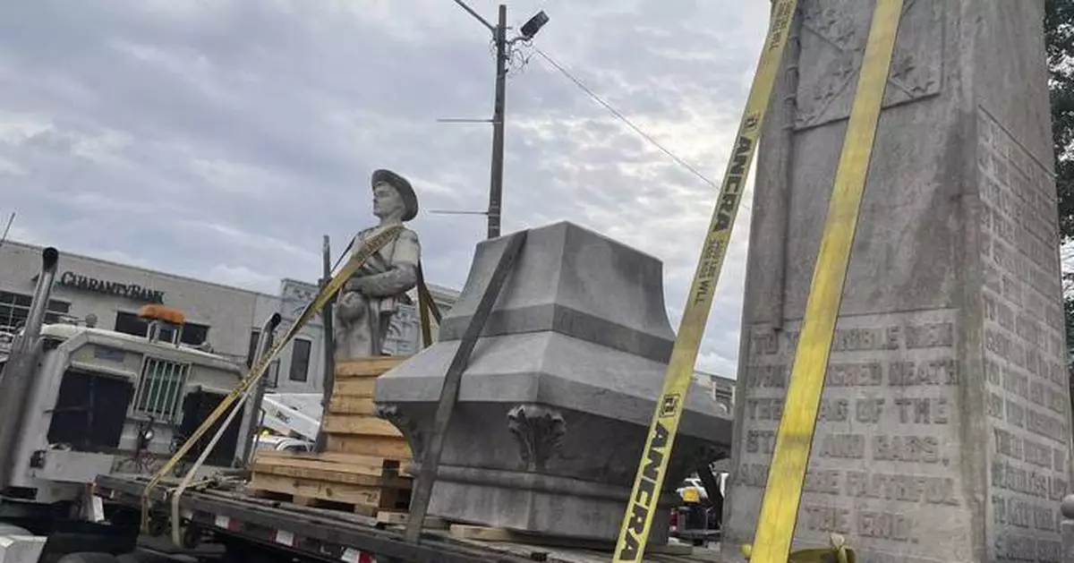 A Mississippi town moves a Confederate monument that became a shrouded eyesore