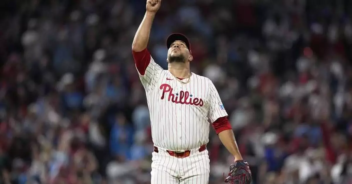 Castellanos homers as the Phillies beat the Cubs 9-6 and clinch first-round bye in playoffs