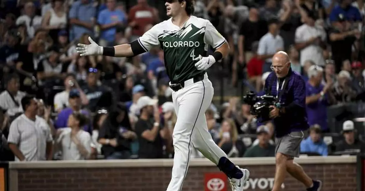 Hilliard ties it with pinch-hit HR in 9th and Doyle's single in 10th lifts Rockies over Cubs 6-5