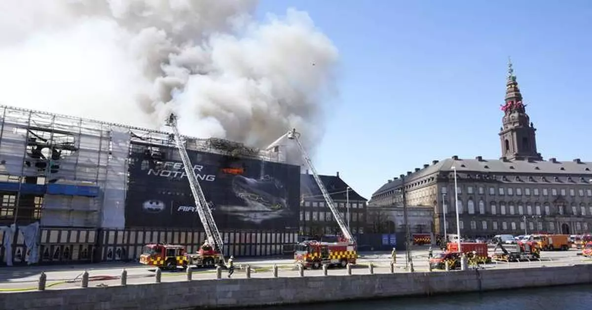 Denmark's king marks reconstruction of famed landmark badly damaged by fire