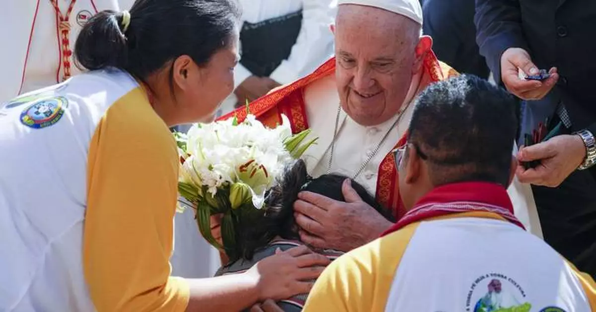 Pope lands in economic power Singapore after a joyous visit to impoverished, devout East Timor