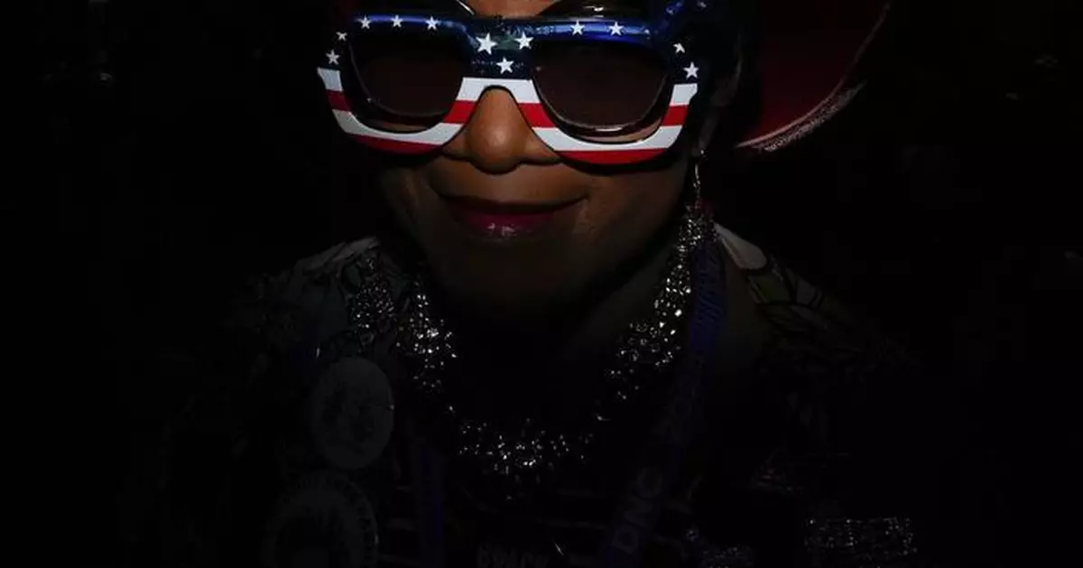 Using some ingenuity with a flash, an AP photographer gets to the red, white and blue of a portrait