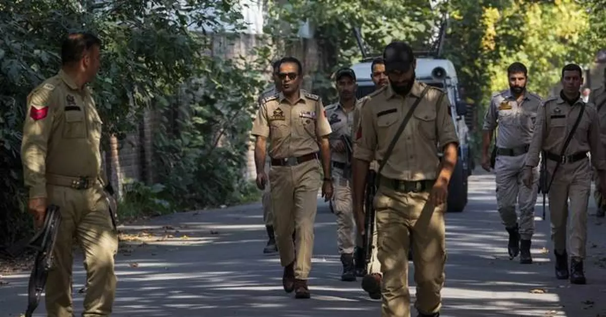 Residents in India-controlled Kashmir vote in the second phase of polls surrounded by heavy security