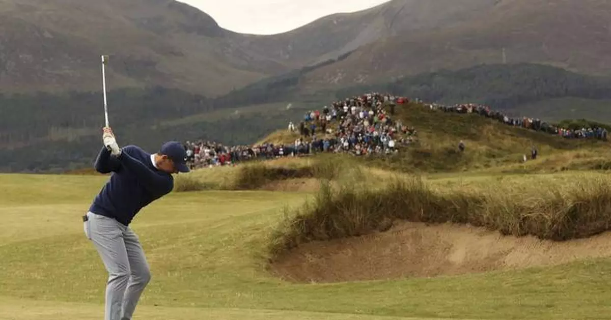 Manassero handles cold and wind for Irish Open lead and McIlroy is 2 behind