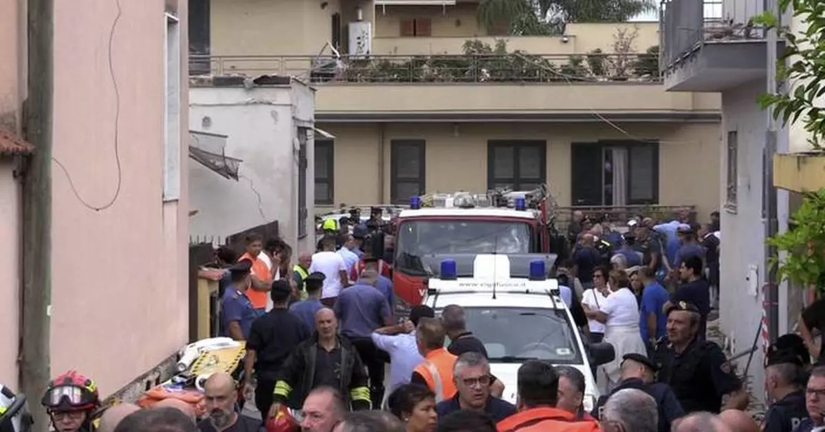 Building collapse in Italy kills 2 young siblings and their mother