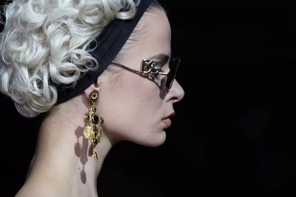 A model wears a creation as part of the Dolce &amp; Gabbana Spring Summer 2025 collection, that was presented in Milan, Italy, Saturday, Sept. 21, 2024. (AP Photo/Antonio Calanni)
