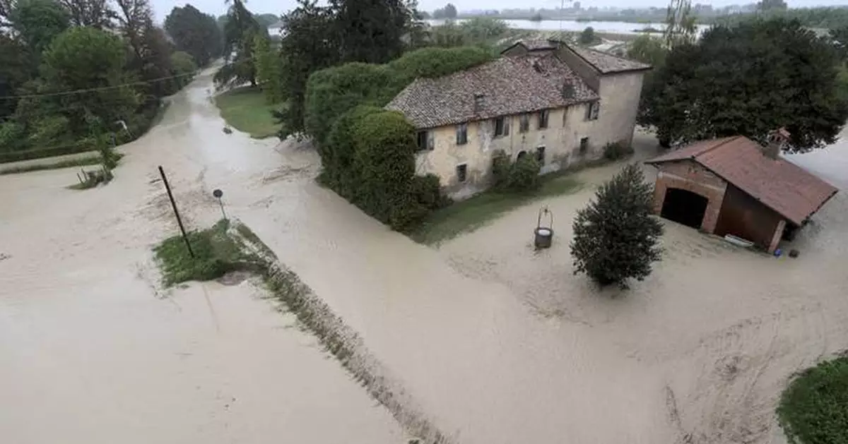 EU chief visits flood-stricken region in Europe and pledges billions in swift aid