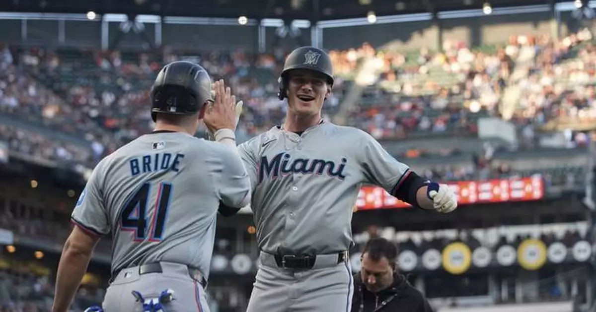 Griffin Conine hits 1st career homer and Marlins hold off Giants 4-3