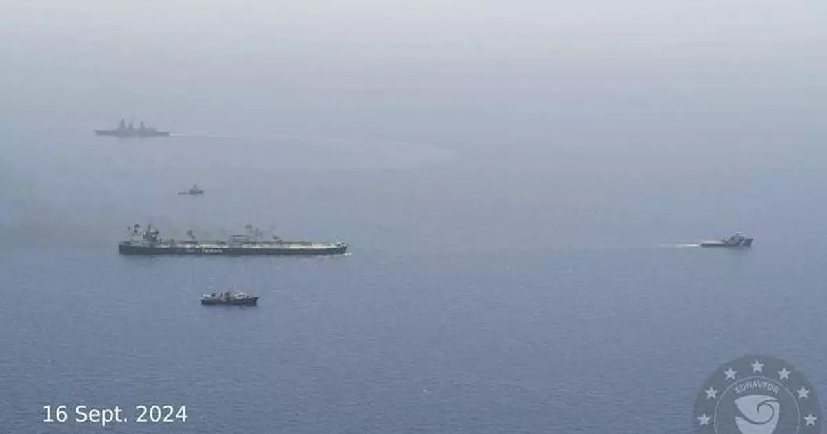 Burning oil tanker is safely towed away from Yemen after rebel attacks