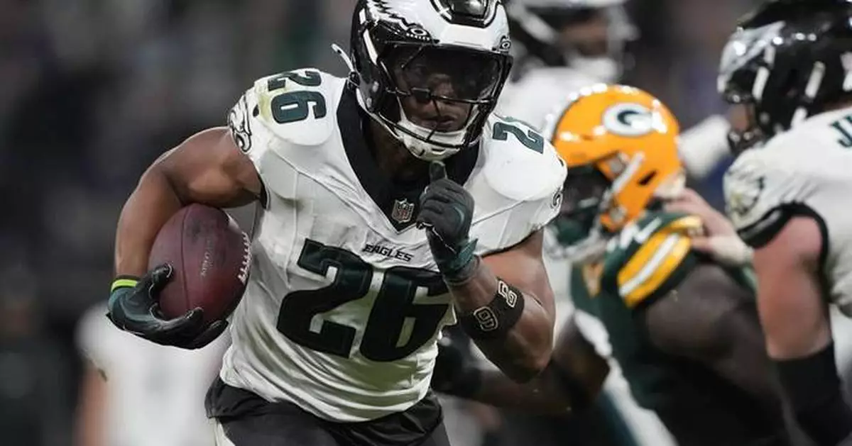 Barkley scores 3 TDs as Eagles beat Packers 34-29 in Brazil. Packers' Love injured in final minute