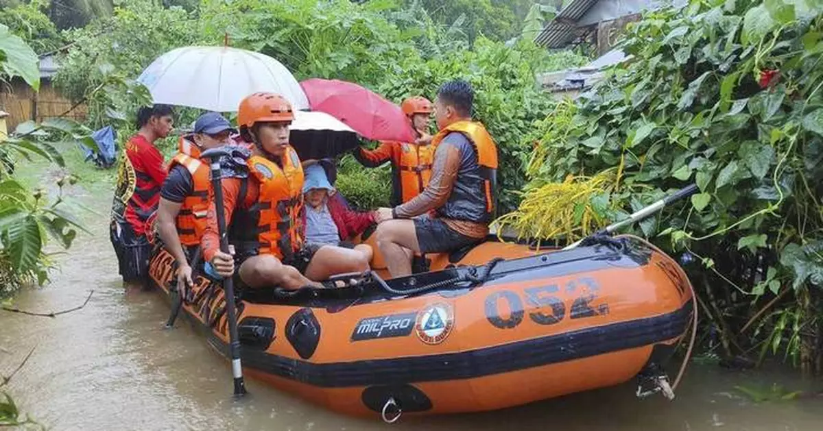 Storm sets off floods and landslides in Philippines, leaving at least 14 dead