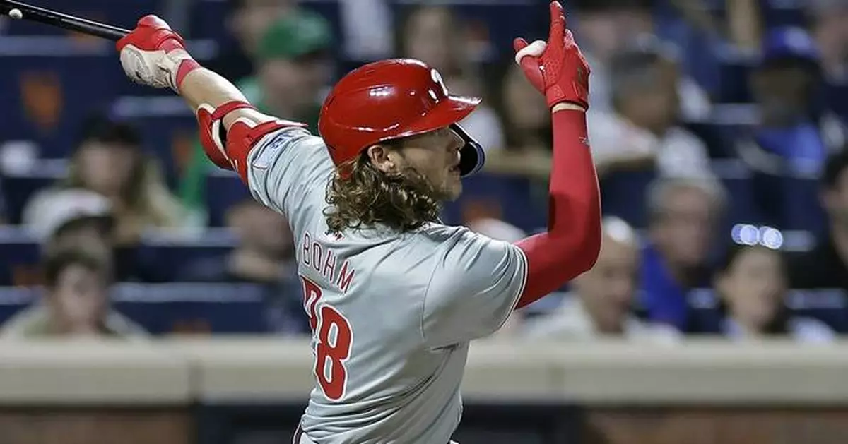 Phillies rout Mets 12-2 behind Bohm to punch playoff ticket and near NL East crown