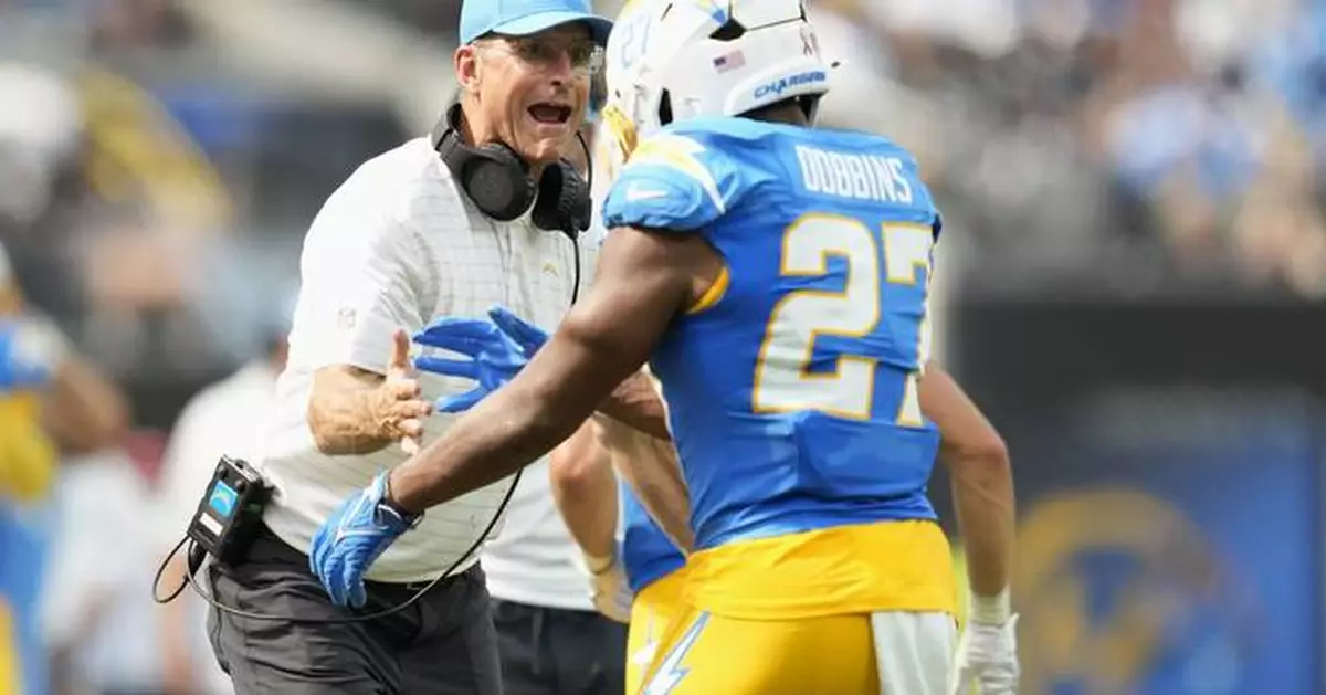 J.K. Dobbins rushes for 135 yards as the Chargers beat the Raiders 22-10 in Jim Harbaugh's debut