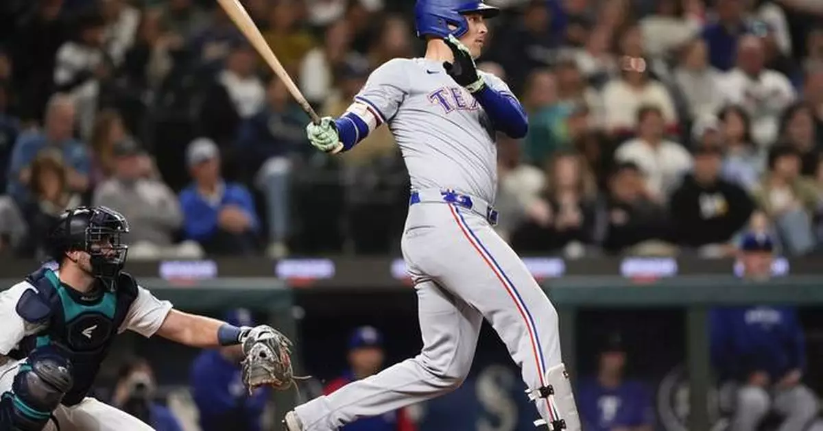 Lowe plates winning run during 3-run 8th and Rangers rally to beat Mariners 5-4 in Rocker's debut