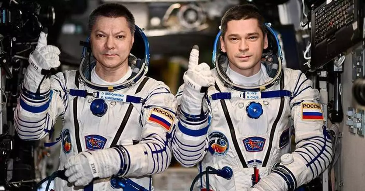 2 Russians set record for longest single stay on the International Space Station