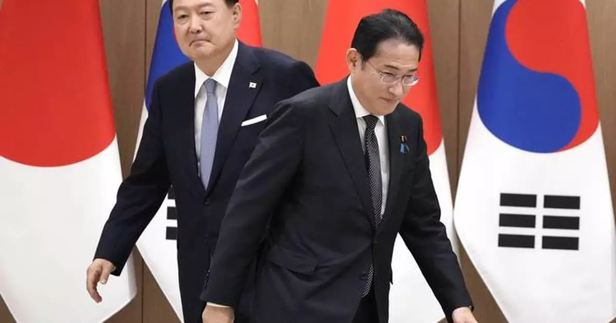 Japan's leader makes a farewell visit to Seoul and reaffirms sympathy for Korean colonial victims