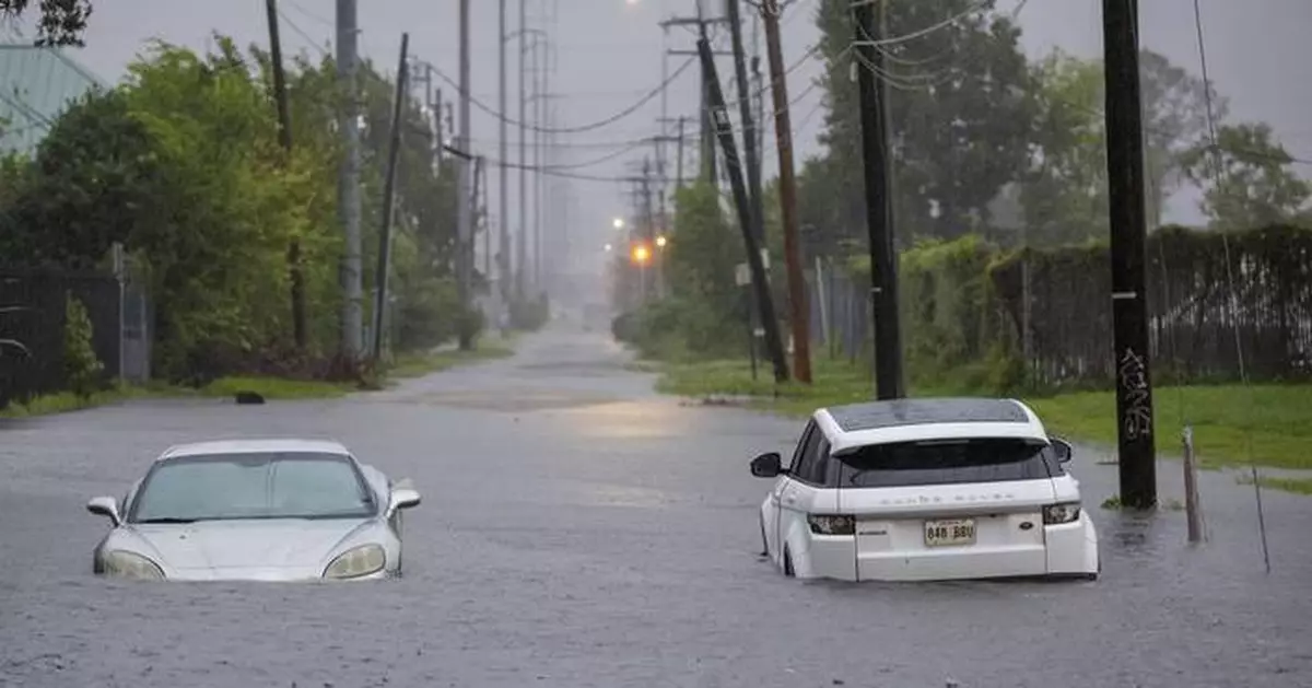 An ER nurse says it was 'second nature' to rescue a man trapped in hurricane floodwaters