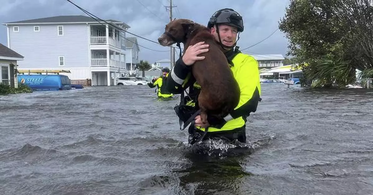 'Firehose' storm hits part of North Carolina and scientists see climate change