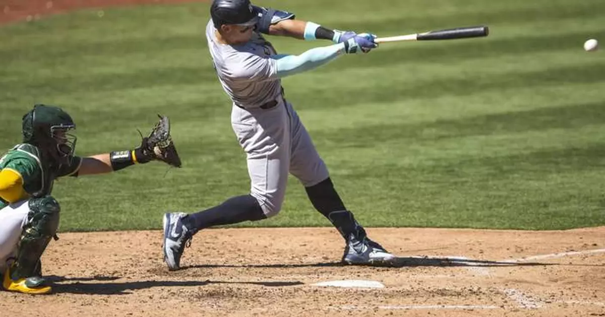 Judge hits 55th homer of season, Yankees beat Athletics 7-4 and draw closer to clinching AL East