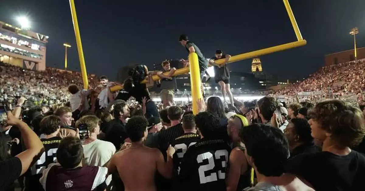 Vanderbilt and Arkansas fined for fans storming the field after upset wins