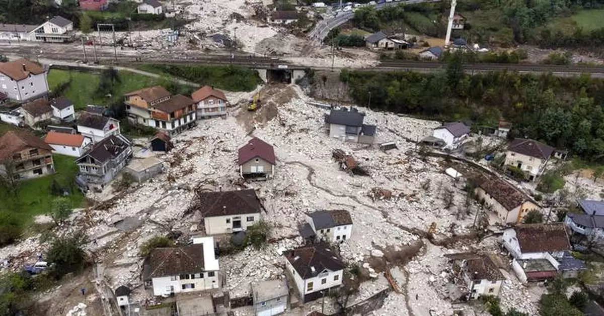 International rescue teams arrive in Bosnia after devastating floods and landslides