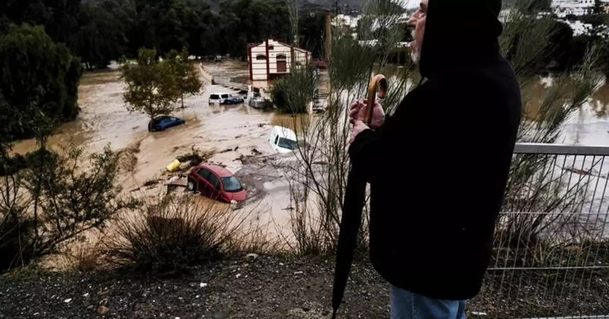 Flash floods in Spain sweep away cars, disrupt trains and leave several missing