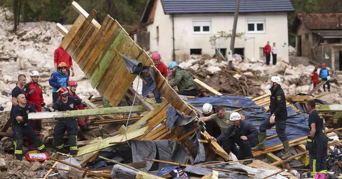 Rescue teams search for missing after floods, landslides kill at least 16 in Bosnia