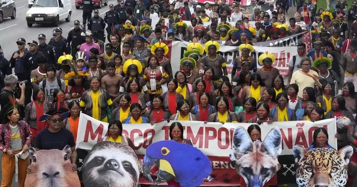 Indigenous people march in Brazil's capital against bill limiting land rights
