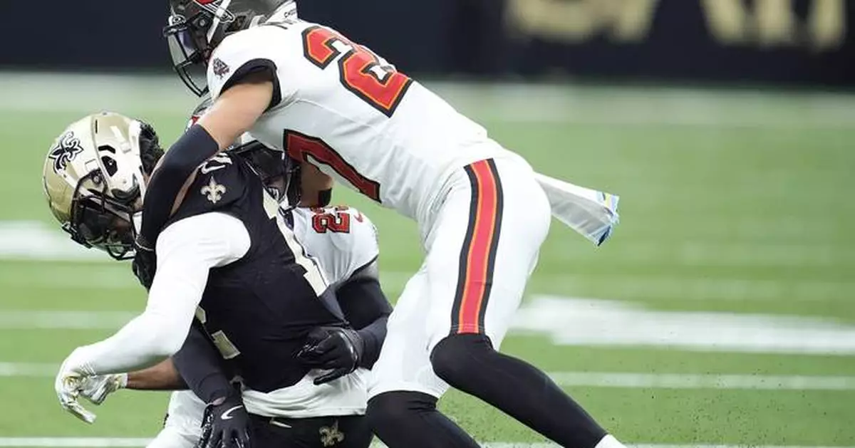 Saints receiver Chris Olave sidelined against Tampa Bay by an unflagged helmet-to-helmet hit