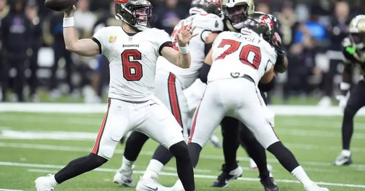 Mayfield passes for 4 TDs as the Bucs treat storm-weary fans to a 51-27 win over the Saints