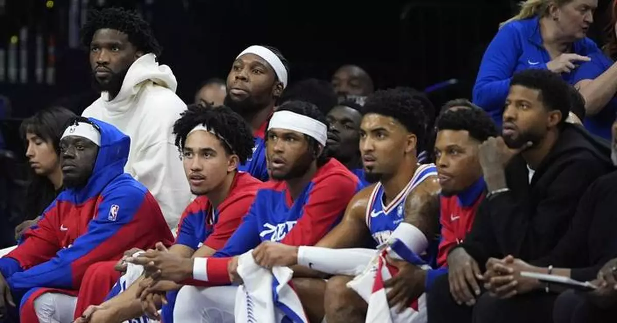 Embiid drawing criticism for sitting out 76ers' opener as part of health plan to reach the playoffs