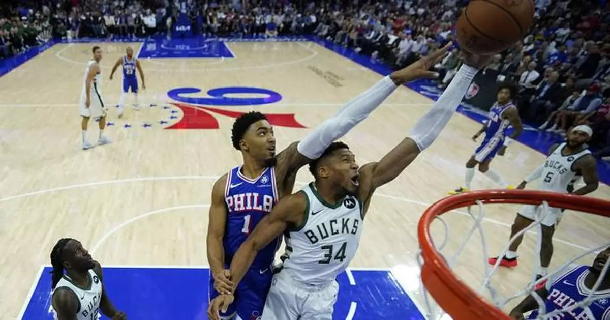 Lillard and Antetokounmpo power Bucks past short-handed 76ers 124-109