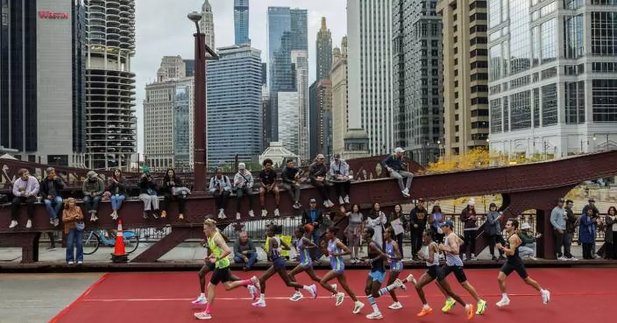 Ruth Chepngetich of Kenya smashes world record by nearly 2 minutes at Chicago Marathon